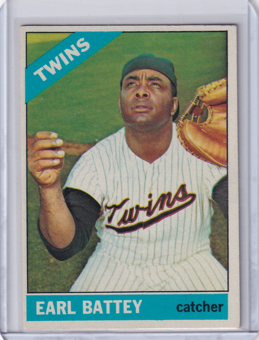 Earl Battey Topps Baseball card featuring Minnesota Twins catcher with glove and ball