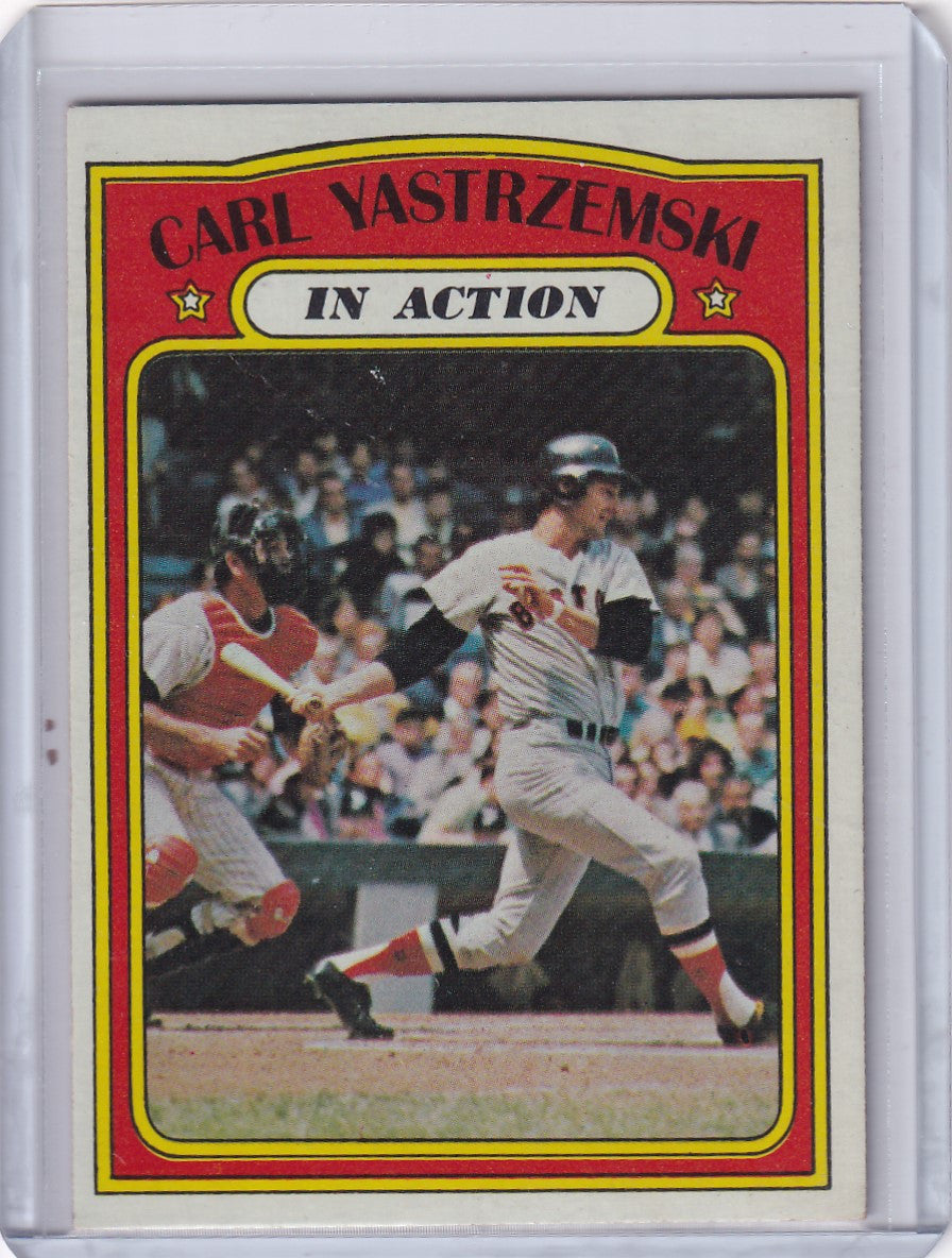 Vintage Topps Baseball card of Boston Red Sox player Carl Yastrzemski in action