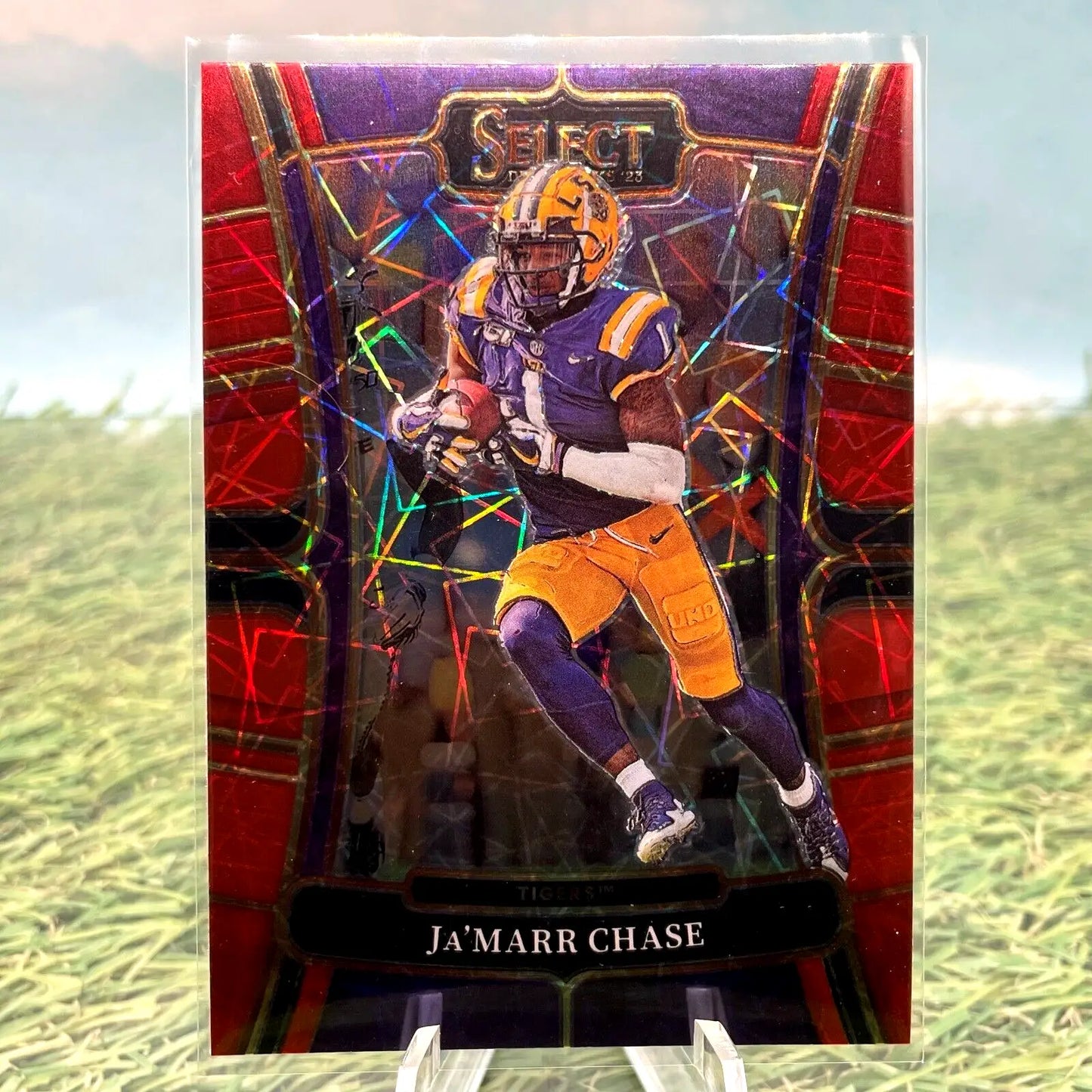 Ja’Marr Chase trading card featuring player in purple and yellow uniform making a catch