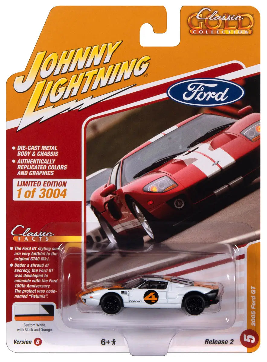 Die-cast toy car model of a white Ford GT in Johnny Lightning JLCG032 Classic Gold packaging