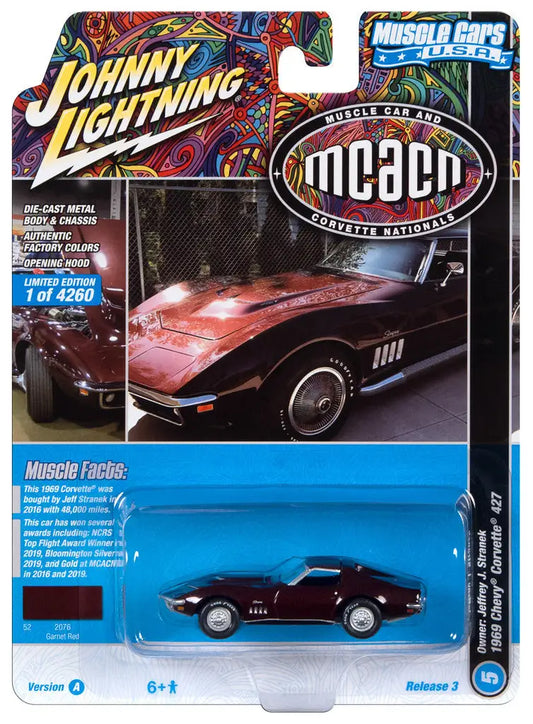 Die-cast model car of a black Chevrolet Corvette in Johnny Lightning JLMC031 packaging