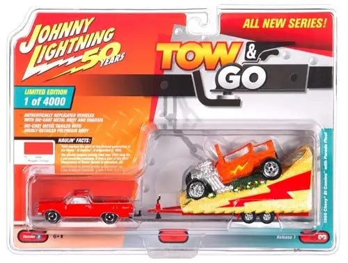 Johnny Lightning Tow & Go 1:64 Chevy El Camino with red truck, trailer, and off-road vehicle