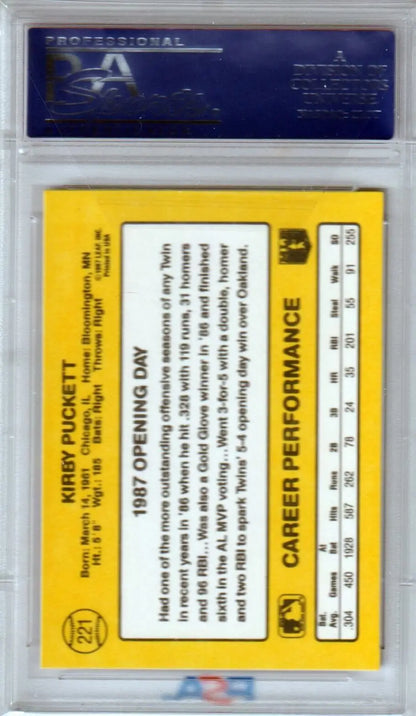 Yellow and blue graded baseball card of Kirby Puckett in protective holder for single cards