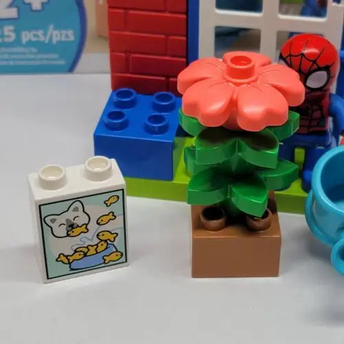 LEGO flower with coral petals on brown base in Spider-Man’s House Marvel Spidey set