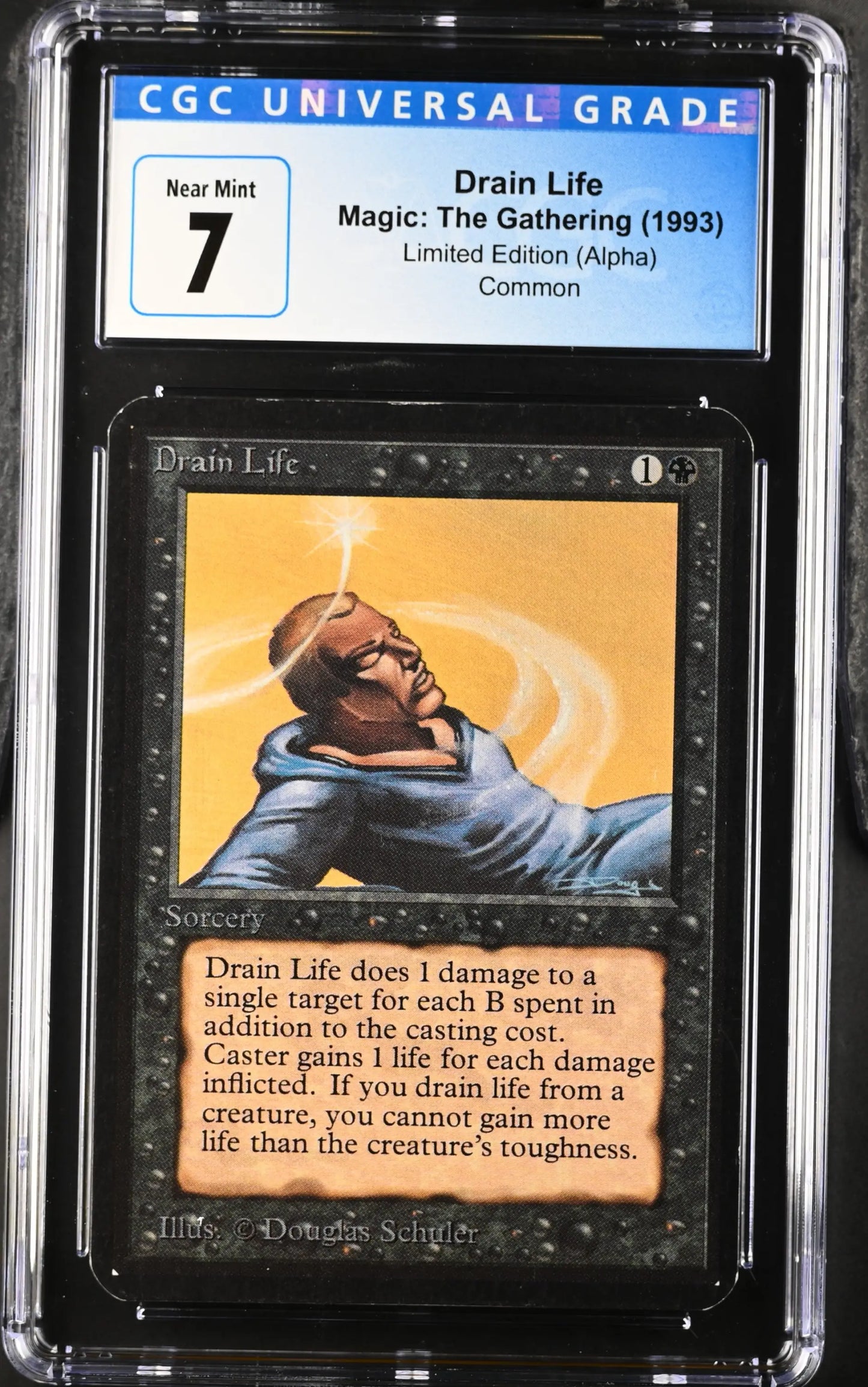 Graded CGC 7 Magic: The Gathering Alpha Edition Drain Life trading card in encapsulation