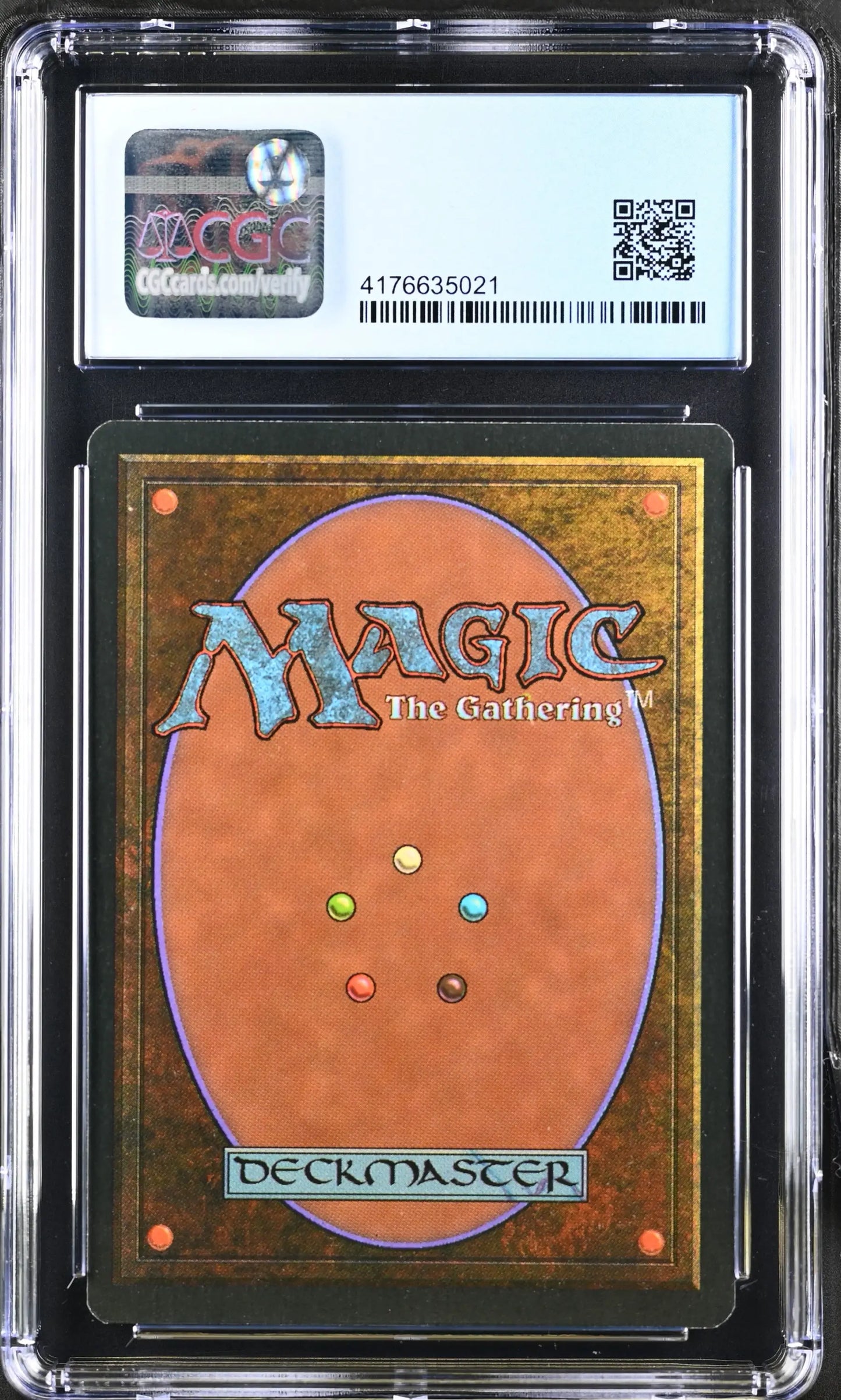 Encased Magic: The Gathering Revised Edition card back in CGC 9 Mint protective case