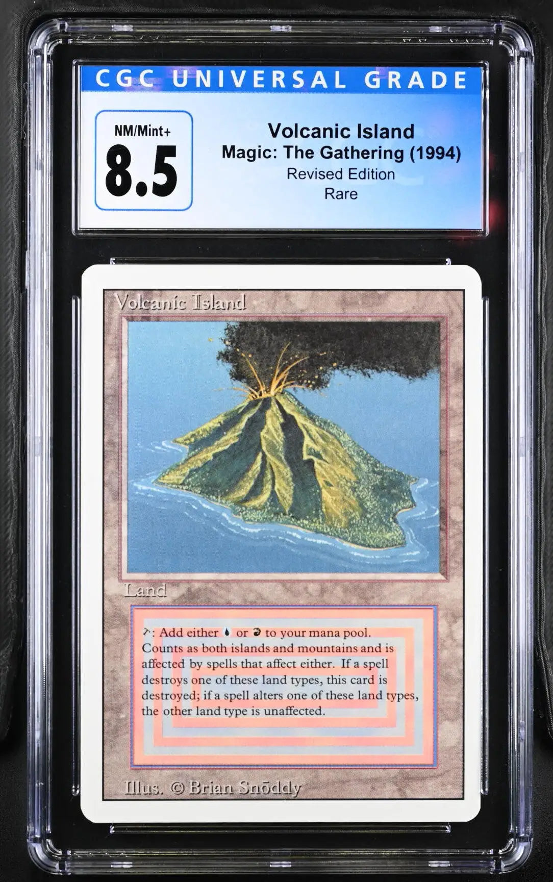 Graded Volcanic Island Magic: The Gathering card from Revised Edition trading cards