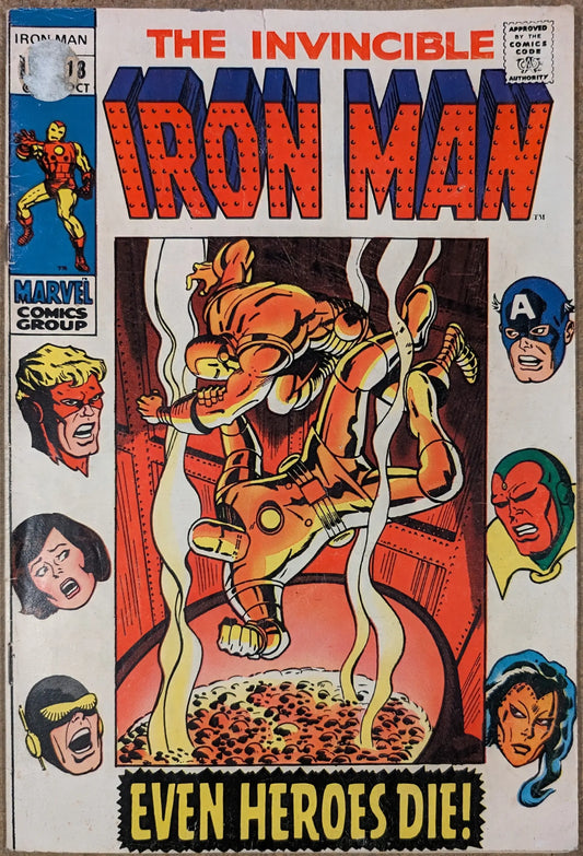 Vintage Invincible Iron Man comic book cover with golden armored figure amid flames