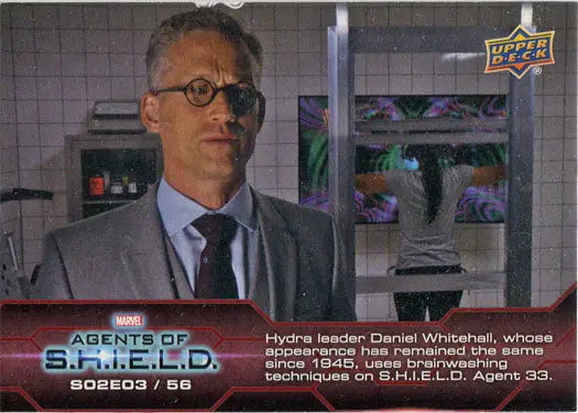 Man in gray suit with glasses featured on Marvel Agents of SHIELD chase card