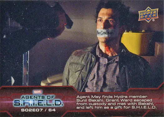 Trading card of a mustached man in plaid from Marvel Agents of SHIELD Chase Card