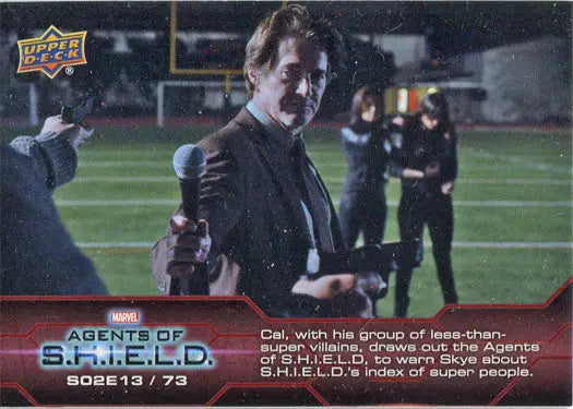 Trading card of a man in a dark suit on a night sports field for Marvel Agents of SHIELD Chase Card