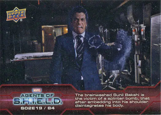 Man in blue suit with glowing hand from Marvel Agents of SHIELD Chase Card 84