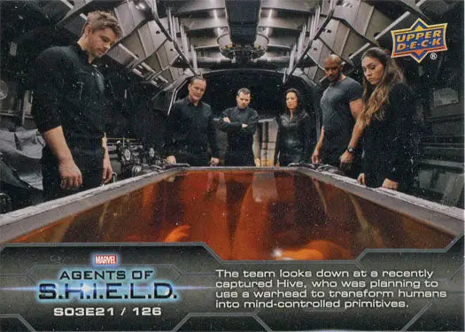 Group of people in high-tech setting themed around Marvel Agents of SHIELD chase card