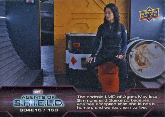 Woman in black on orange container in industrial setting for Marvel Agents of SHIELD chase card