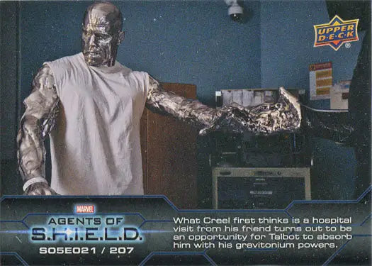 Humanoid figure with metallic skin in white t-shirt on Marvel Agents of SHIELD chase card