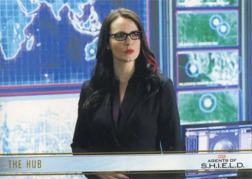 Woman in glasses and black jacket at podium on Marvel Agents of SHIELD base parallel chase card