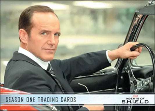 Man in a suit in car for Marvel Agents of SHIELD promo card trading cards collection