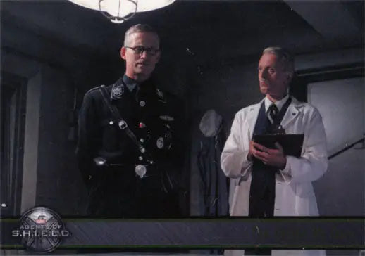 Two men in uniform and lab coat featured on Marvel Agents of SHIELD Gold Parallel trading card