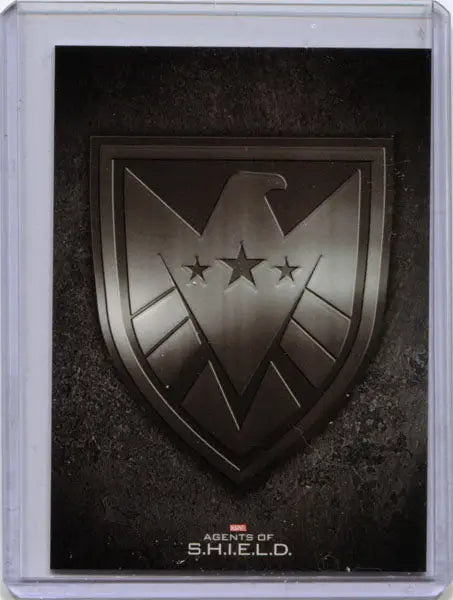 Metallic shield-shaped emblem with eagle and stars for Marvel Agents of SHIELD Card Topper CT1