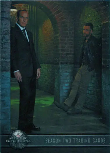 Two men in suits in an industrial setting on a Marvel Agents of SHIELD promo card