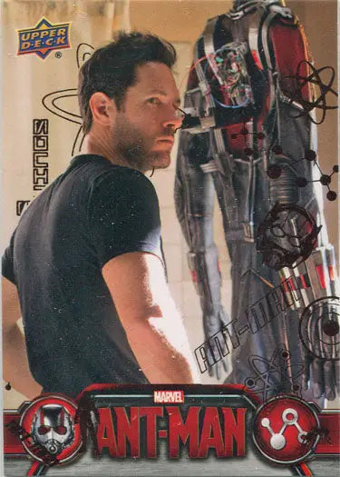 A man stands beside a futuristic armor in Marvel Ant-Man Bronze Base Parallel Chase Card 31