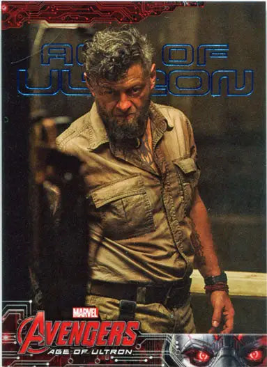 Bearded man in a tan shirt showcasing Marvel Avengers Age of Ultron Blue Foil trading card