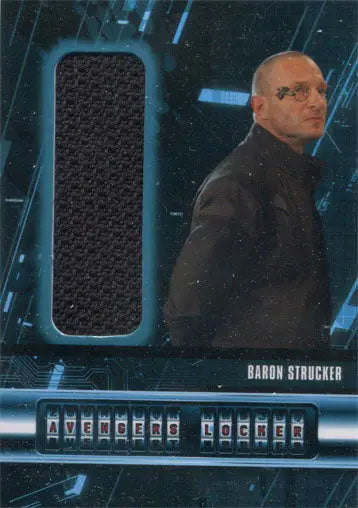 Trading card of Thomas Kretschmann as Baron Strucker in a dark jacket with fabric swatch