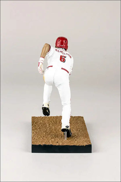 Baseball player figurine in white and red uniform for MLB trading cards collection