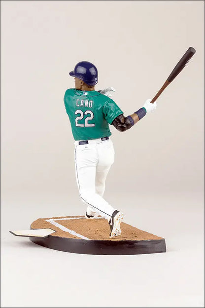 Baseball player figurine of Robinson Cano in green jersey 22, ideal for baseball cards collectors