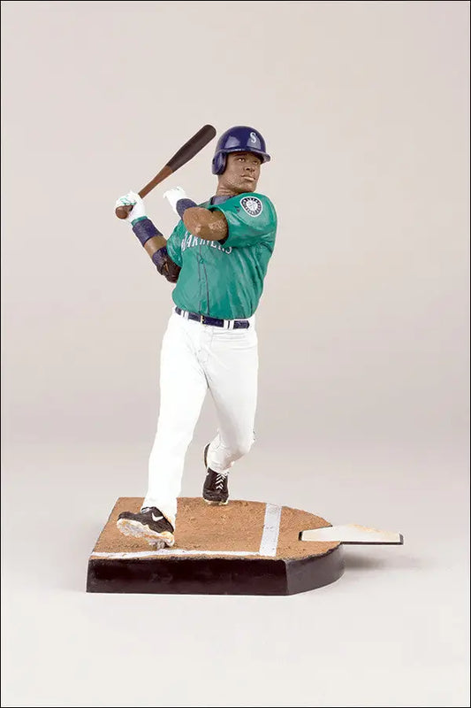 Baseball player figurine of Robinson Cano in batting stance for baseball cards display