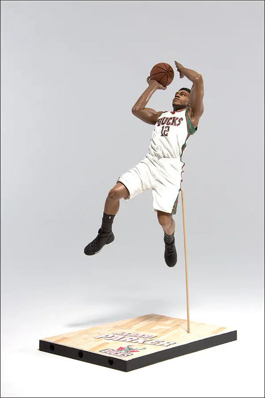 Basketball player figurine of Jabari Parker in mid-jump for NBA trading cards collection