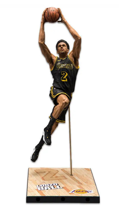 Basketball player figurine of Lonzo Ball in mid-jump for Los Angeles Lakers collectible