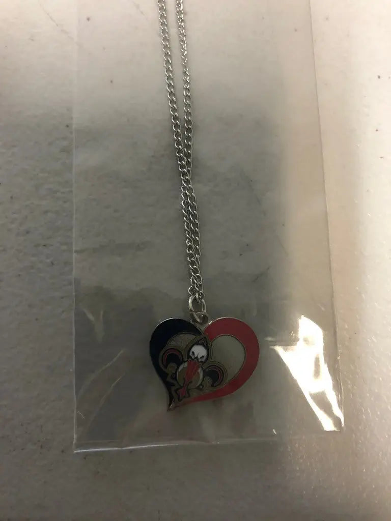 Heart-shaped pendant necklace featuring a red and black NBA swirl heart design