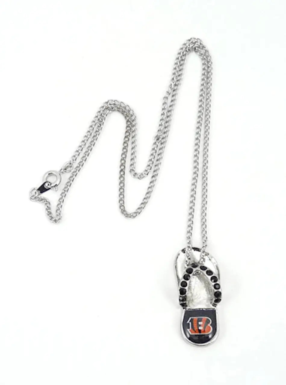 Silver football helmet pendant necklace featuring Cincinnati Bengals logo in crystal flip flop design