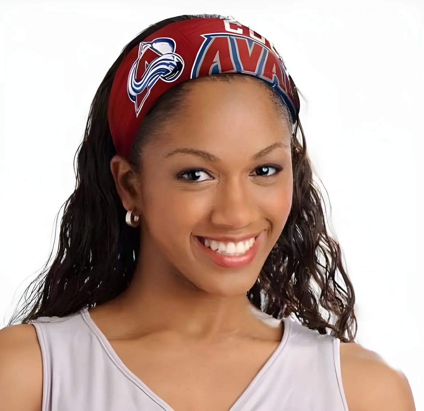 Smiling woman showcases red Atlanta Hawks head band from NHL Jersey Fanbands collection