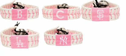 Pink and white baseball-themed bracelets featuring MLB team logos for baseball fans