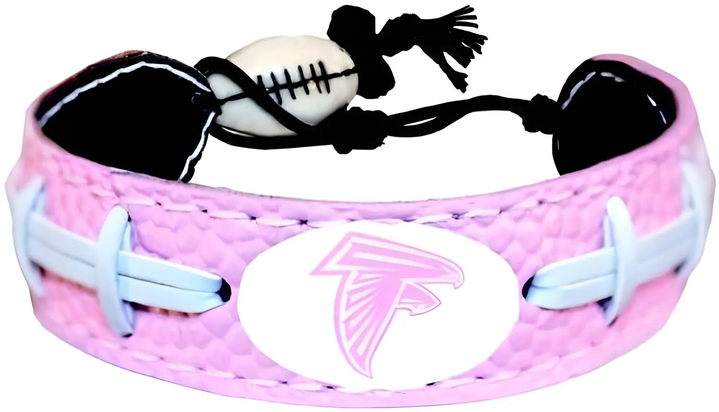 Pink and white sports bracelet with Atlanta Falcons logo for football card enthusiasts