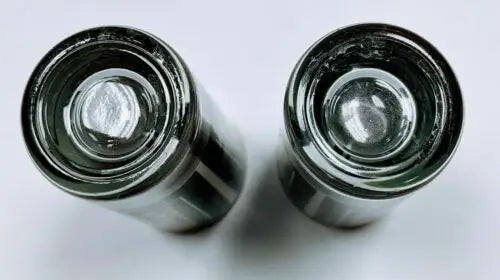 Two metallic cylindrical Oregon Ducks shot glasses with original gloss finish