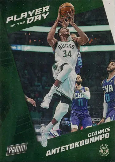 Basketball player in white Bucks jersey 34 leaping with ball on Panini base card