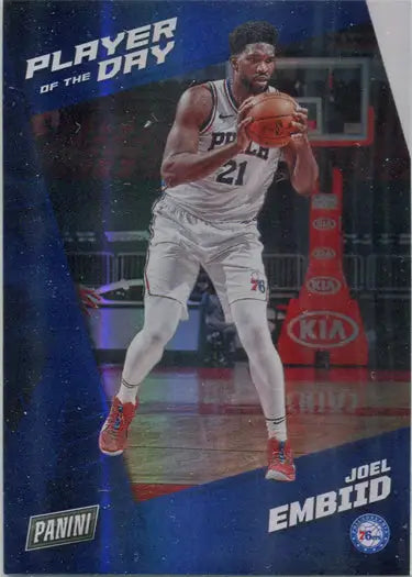 Basketball trading card of Joel Embiid in white uniform, showcasing a rainbow parallel design