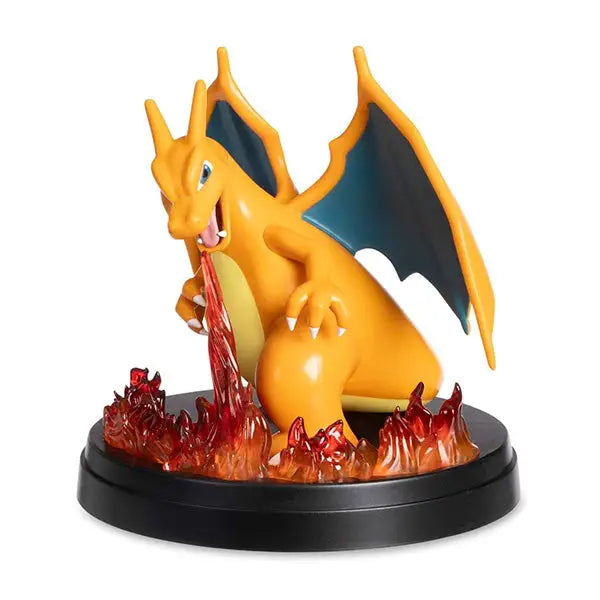 Orange dragon figure featuring black wings on flame display, Pokémon TCG Super-Premium Collection