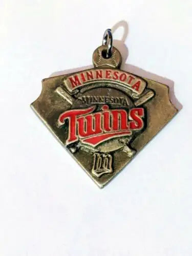 Retired Minnesota Twins pewter pendant featuring the official Minnesota Twins MLB logo