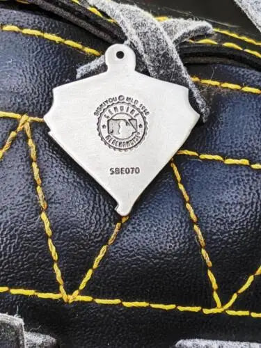 White metal tag with logo and serial number on black leather for Seattle Mariners pewter pendant