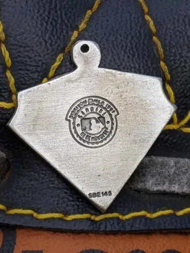 Triangular White Sox pewter pendant with circular logo, ideal for collectors