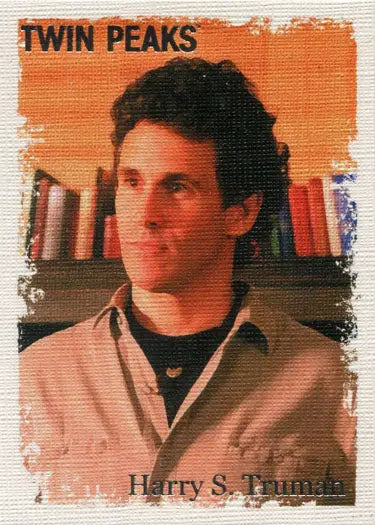 Portrait of young man with dark curly hair in light shirt from Twin Peaks Original Stars card