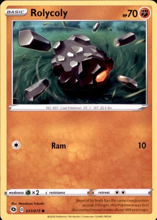 Black and gray Rolycoly Pokémon with glowing orange eye from Pokémon Champions Path