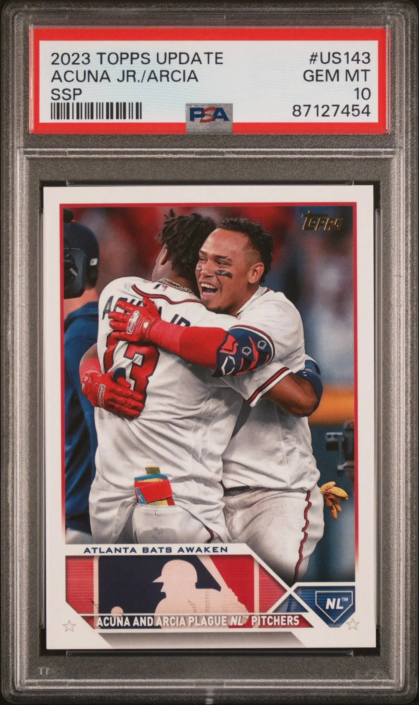 PSA 10 Gem Mint 2023 Topps Update Golden Mirror SSP of Braves teammates celebrating