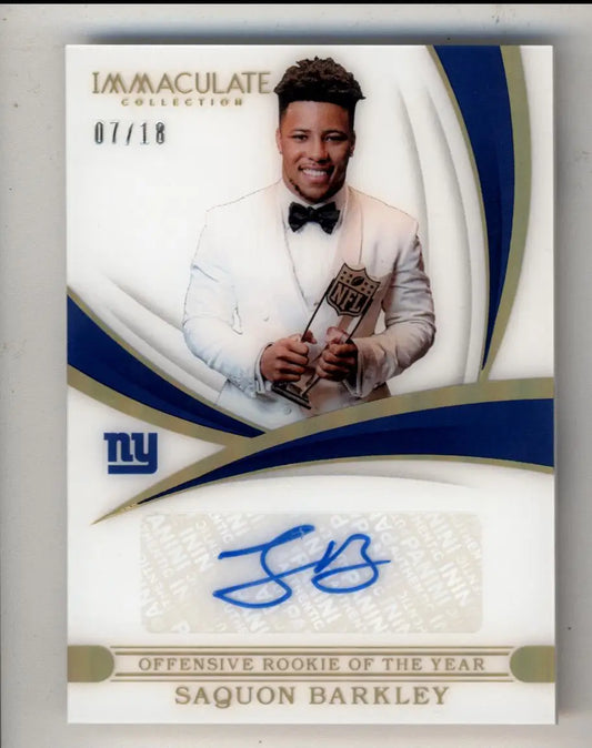 Saquon Barkley NFL trading card in white tuxedo, trophy, and blue autograph