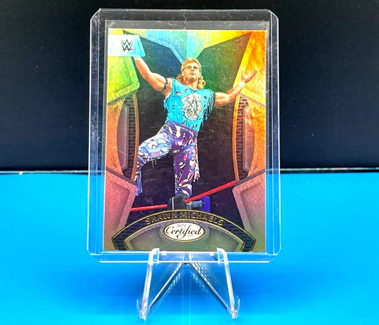 Shawn Michaels 2023 Panini Chronicles WWE trading card in protective display stand