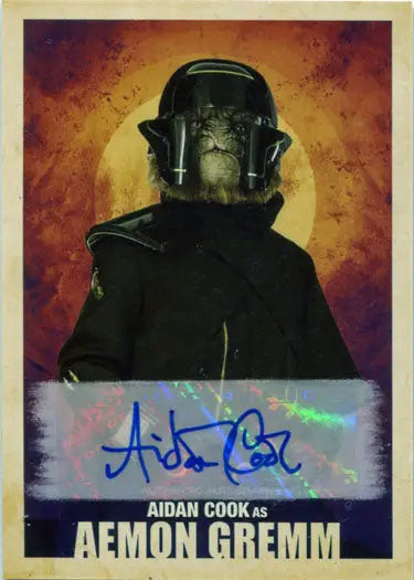 Chimpanzee in black helmet with colorful background for Aidan Cook Aemon Gremm autograph card